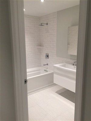 gorgeous looking bathroom with new tub and sink